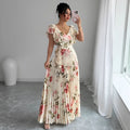Apricot floral print dress with V-neck, ruffled sleeves, and a full high-waisted swing skirt.