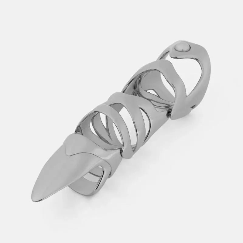 Silver coloured alloy punk armour finger stall ring on a hand.