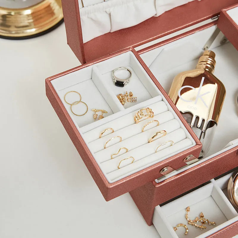 Hard rectangular PU leather jewellery storage box in a choice of black, pink, rose gold, or beige.