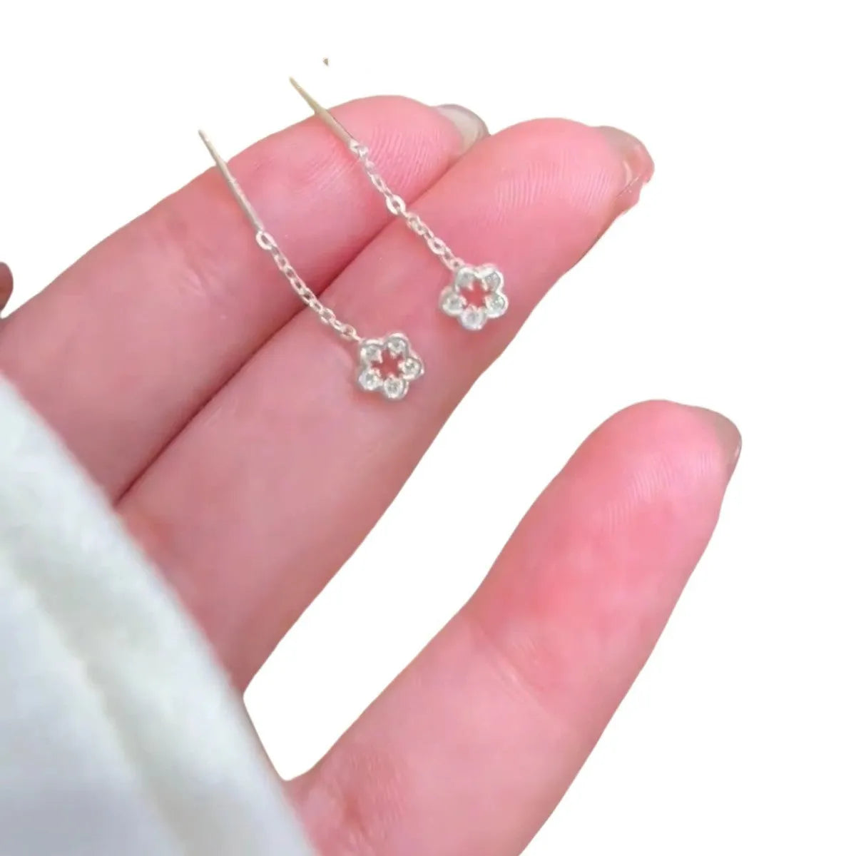 Sterling silver needle hollow flower hanging earrings with silver colour petal design
