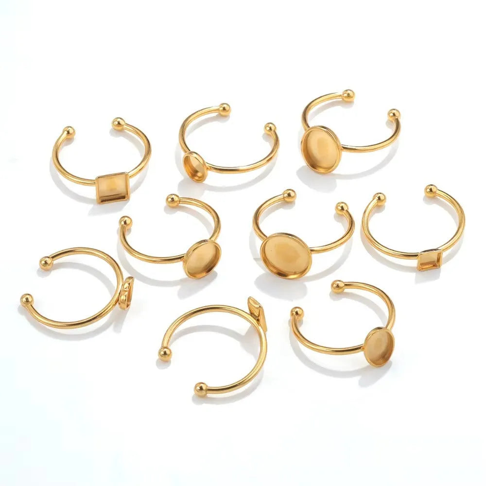 Golden stainless steel ring setting with various bezel shapes for gemstones on ring holder