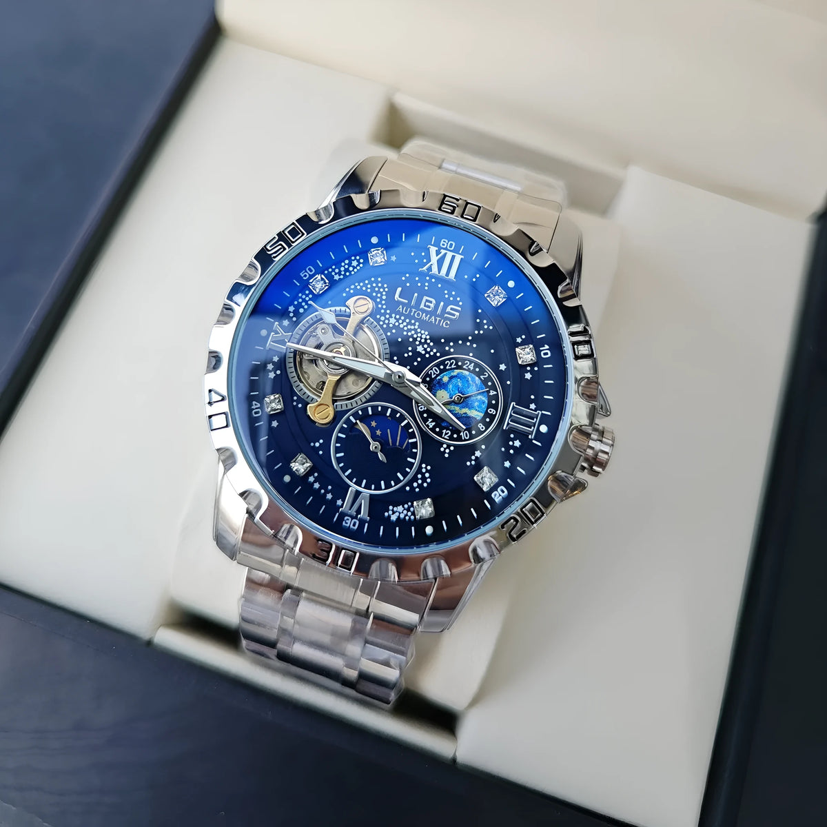 Men's silver automatic mechanical watch with black starry dial and luminous hands on leather strap