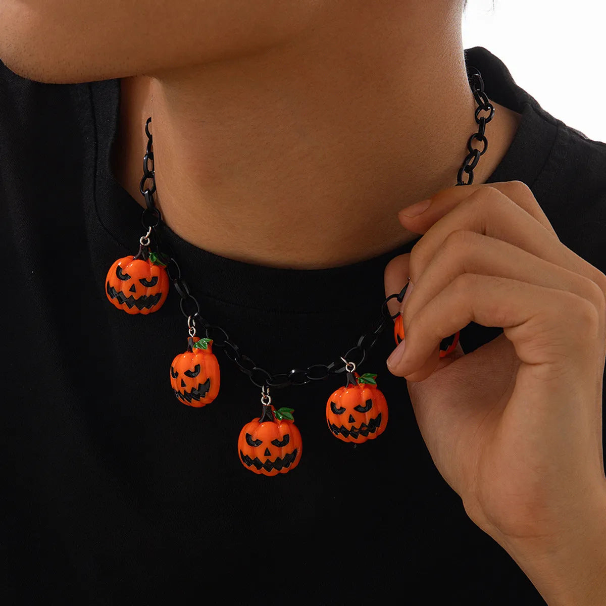 Halloween necklace with acrylic pumpkin ghost pendant on plastic chain in mixed colours