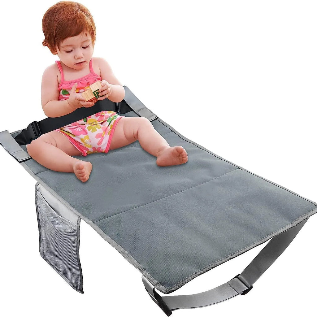 Portable children's aircraft pedal seat extender in blue nylon with extension device.