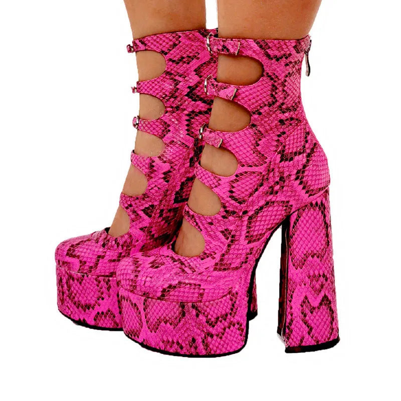 Women's black patent leather waterproof platform high heels with a thick heel and a serpentine ankle strap buckle.