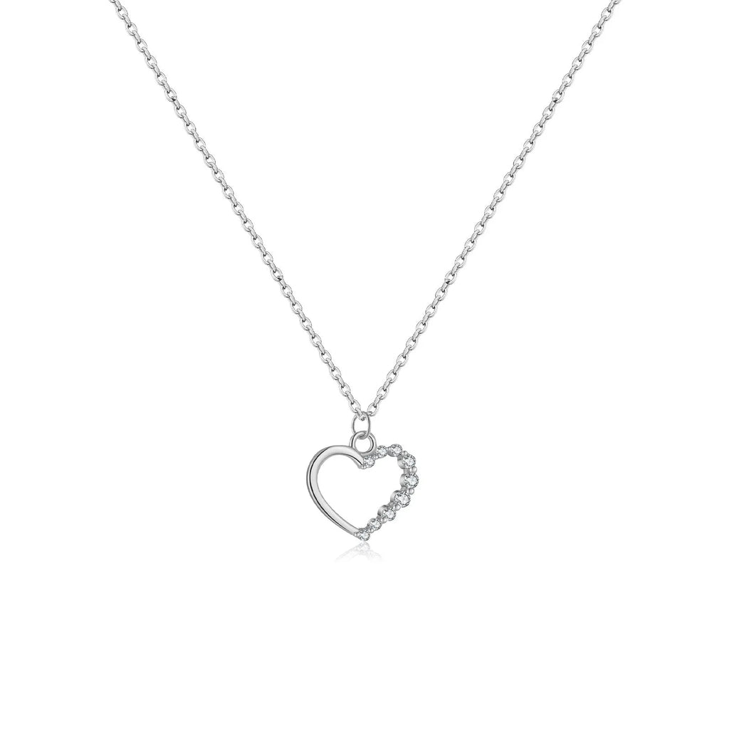 Sterling silver hollow heart necklace with circle elements, available in gold or platinum plating