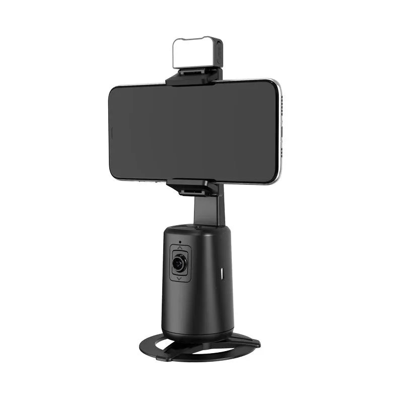 Black ABS desktop phone holder with face tracking, rotating camera head, and built-in LED ribbon lights.