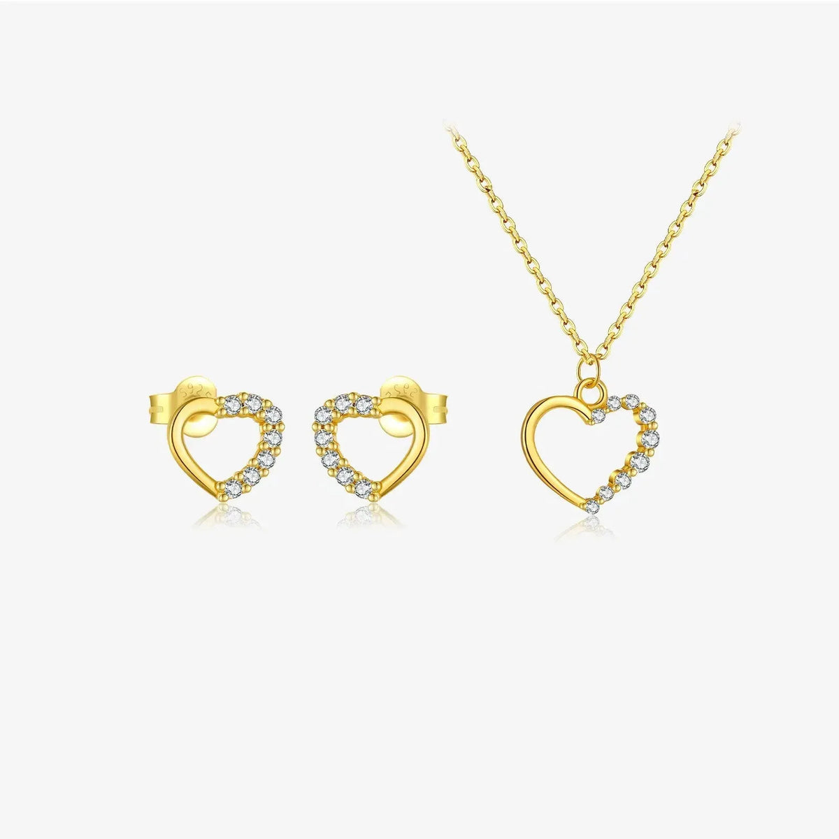 Sterling silver hollow heart necklace with circle elements, available in gold or platinum plating