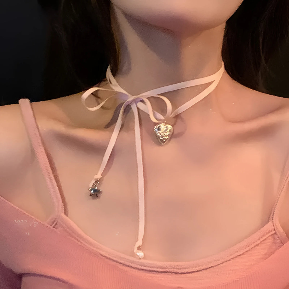Women's alloy necklace with love pendant and ribbon design in electroplated finish