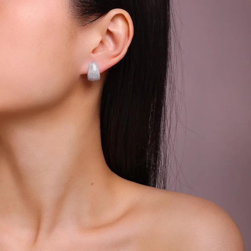Geometric S925 sterling silver ear studs with moissanite stones in extremely white d-e colour