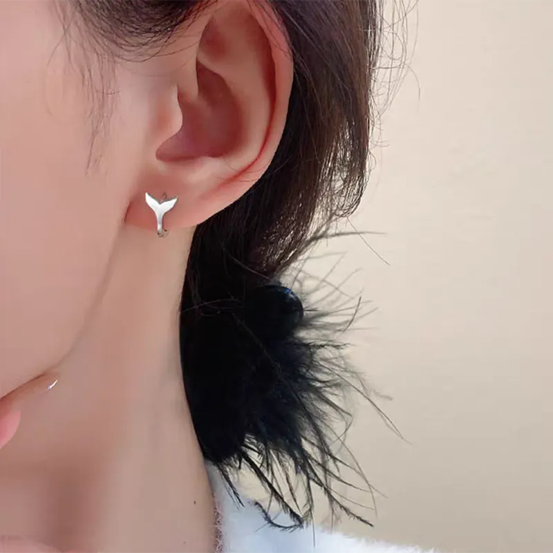 Women's copper fishtail earrings with electroplated white gold or yellow gold finish
