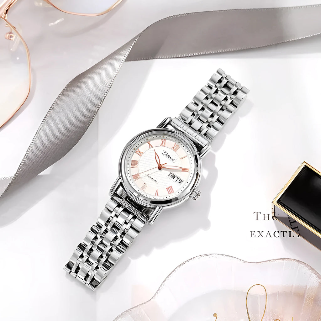 Women's automatic watch with 12mm case on steel bracelet and leather strap options