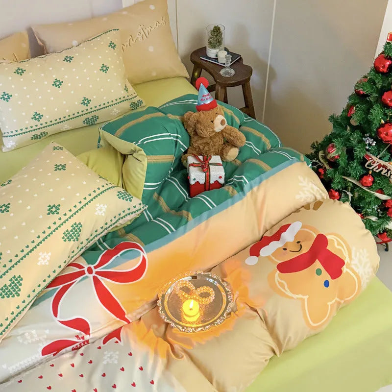 Christmas cartoon print four-piece bedding set on a bed, showing sheet, quilt cover and pillowcases.