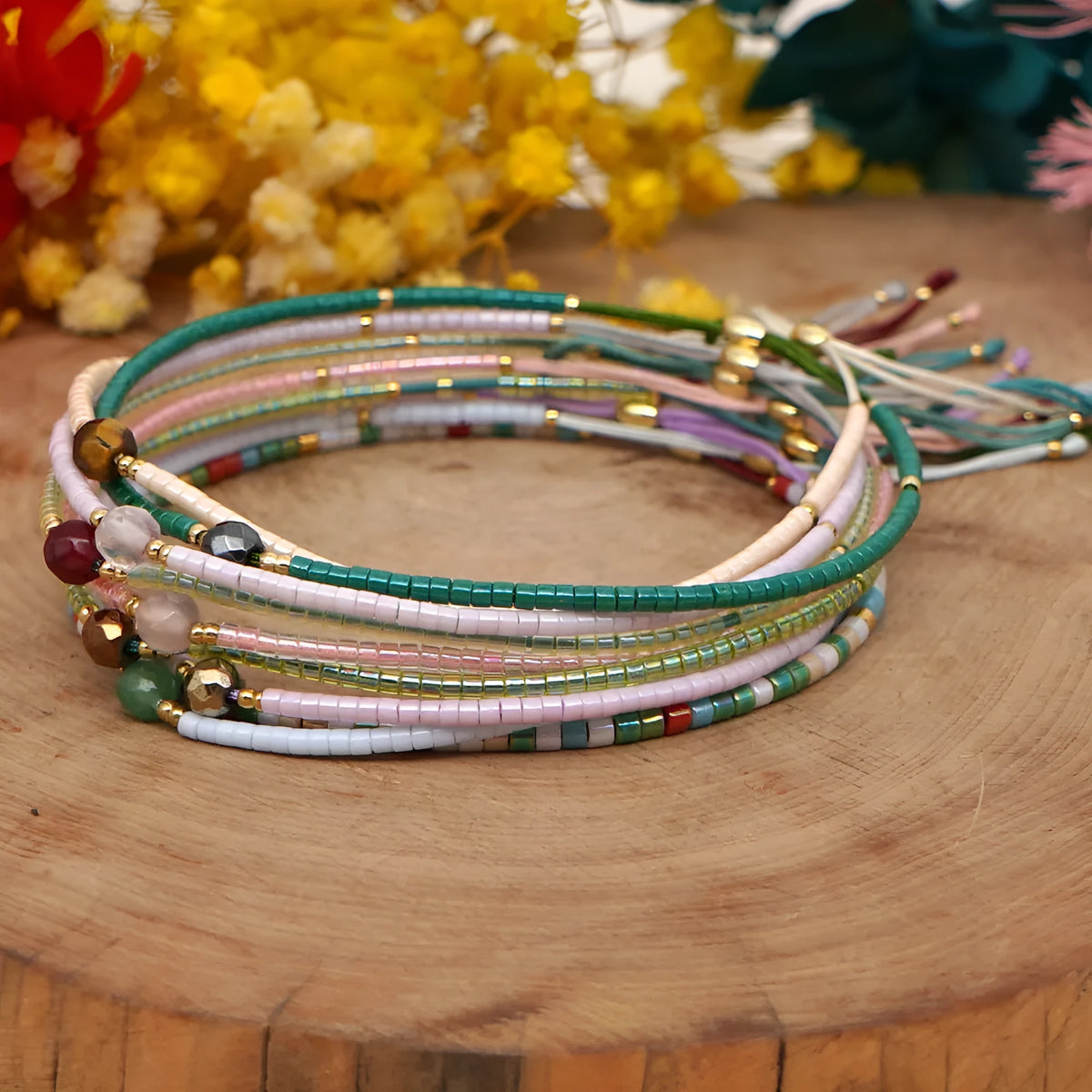 Handmade bohemian bracelet with colourful geometric glass beads in semi-precious stone style