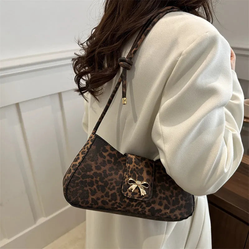 Large casual women's handbag with sandwich pocket design in four colour options