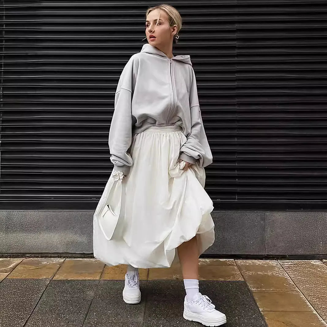 Women's long cotton skirt in solid black or white colour for casual wear.