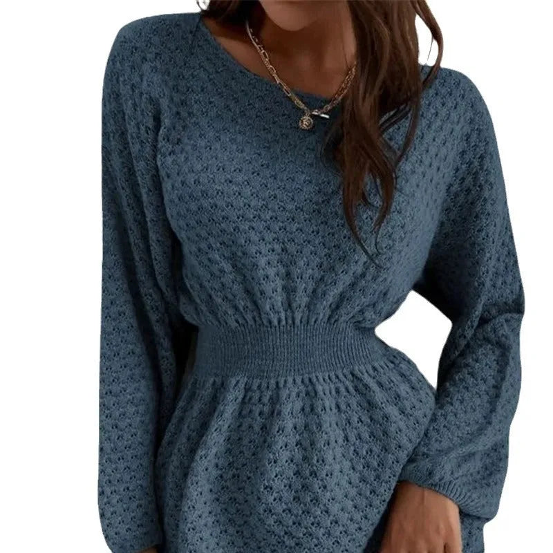 Blue women's knitted sweater dress with hand-crocheted flowers and a fitted waist.