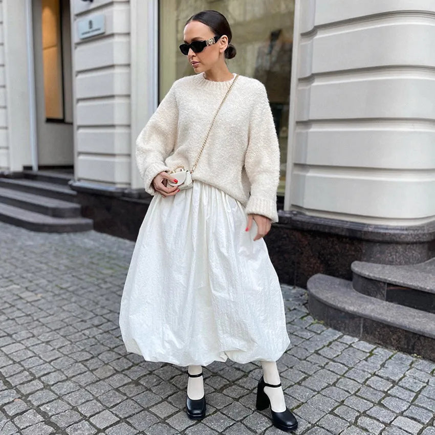 Women's long cotton skirt in solid black or white colour for casual wear.
