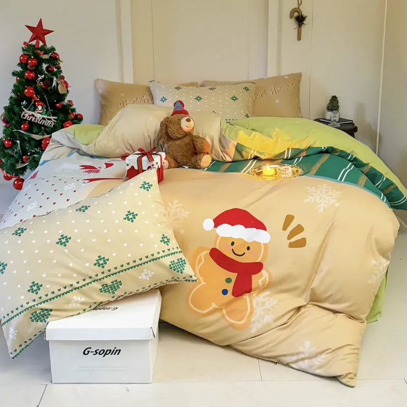 Christmas cartoon print four-piece bedding set on a bed, showing sheet, quilt cover and pillowcases.