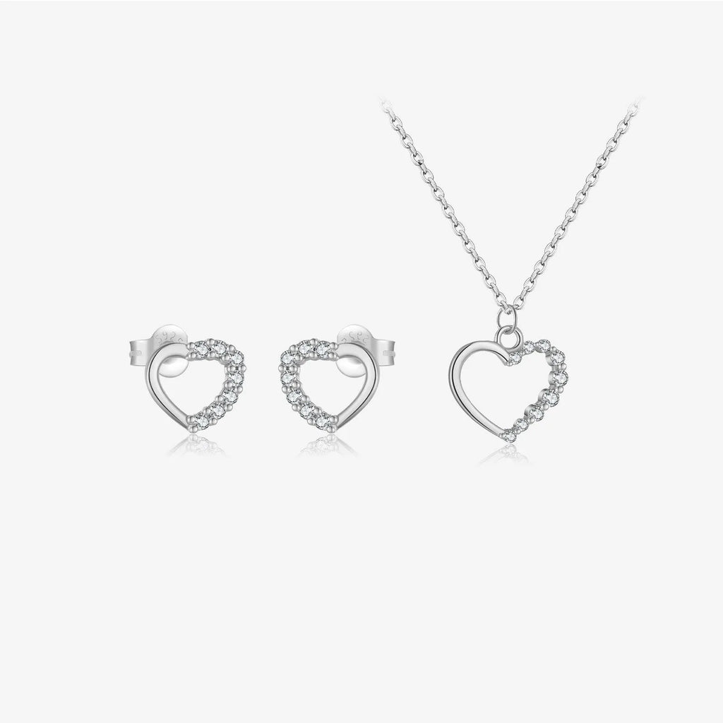 Sterling silver hollow heart necklace with circle elements, available in gold or platinum plating