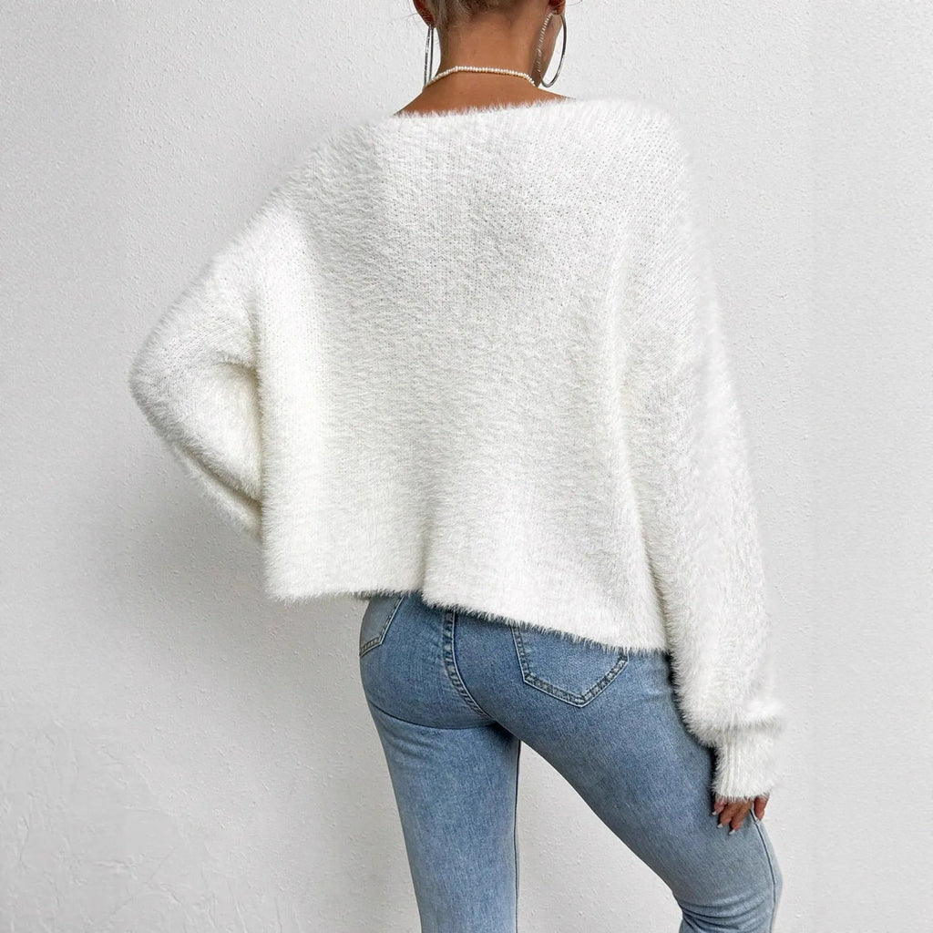 White women's cardigan with V-neck and bead detailing on polyester knit fabric
