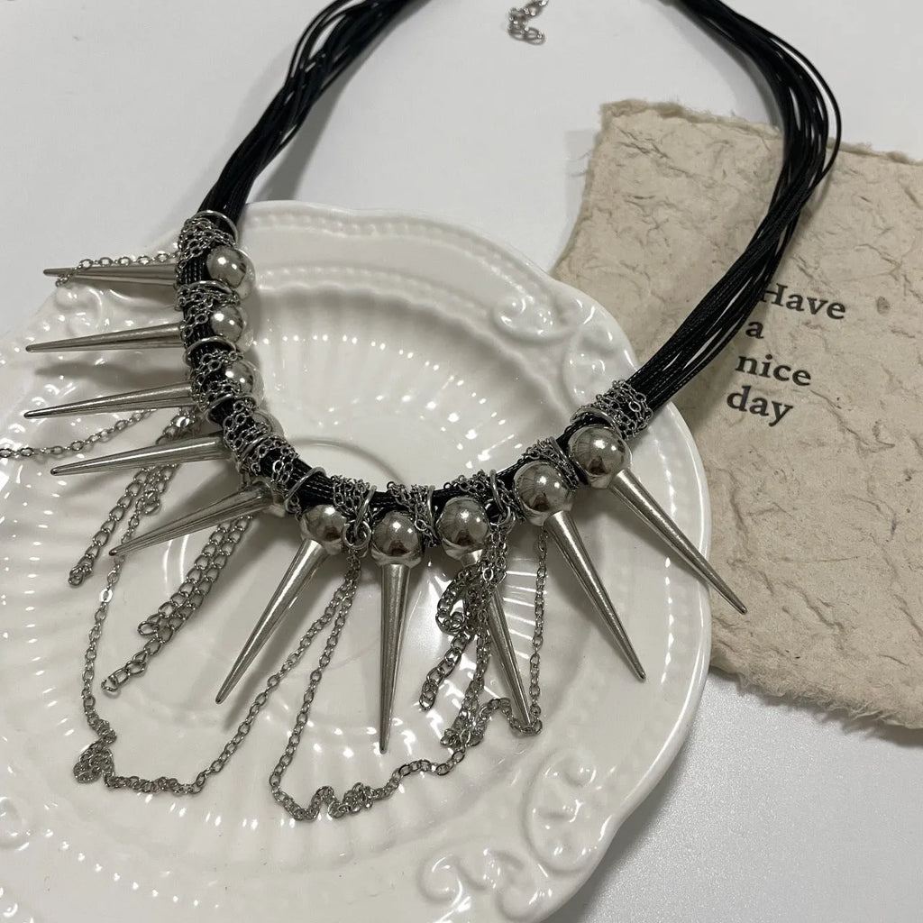 Leather winding tassel necklace with round beads and rivet accents for women