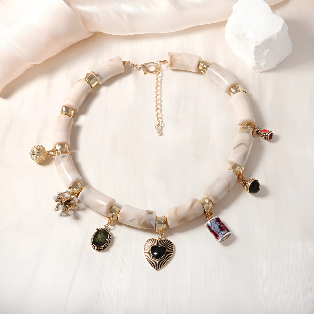 Women's resin bamboo heart necklace with electroplated metallic accents
