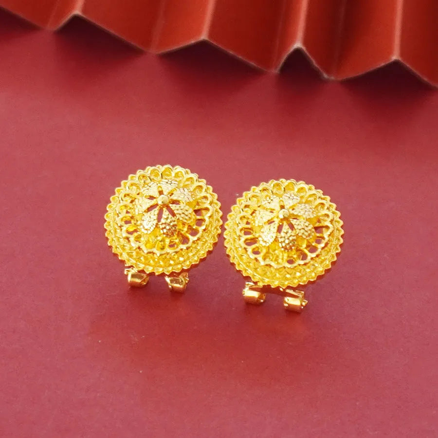 Gold-plated three-piece jewellery set with floral pendant design including necklace, earrings and ring
