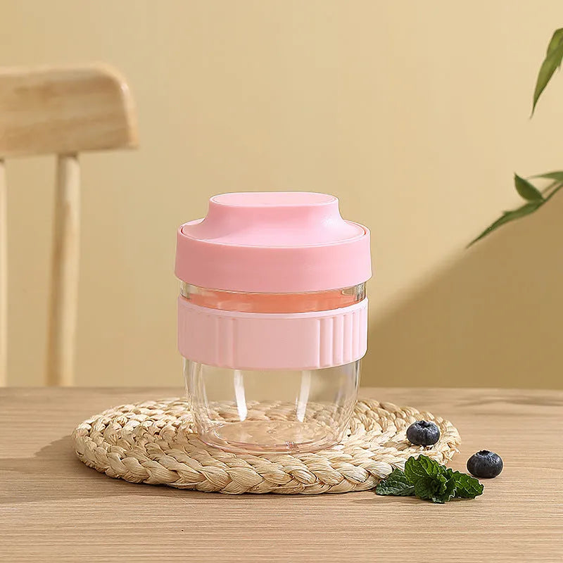 Green plastic salad cup with integrated spoon and lid showing seal and leak-proof design