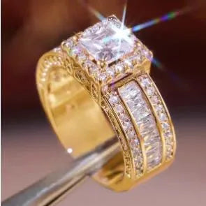 Geometric round design women's engagement ring in gold or white colour with angular patterns