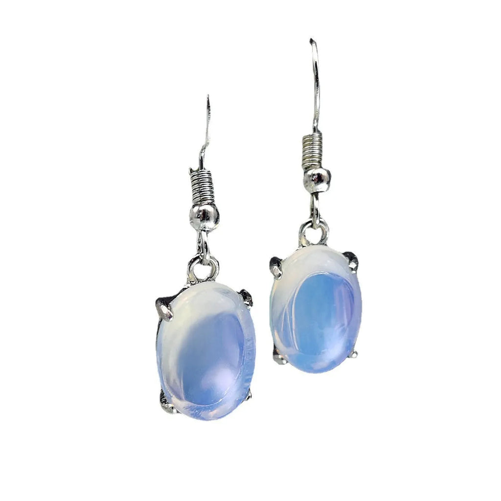Moonlight white opal drop earrings with cross design and ellipse elements