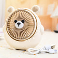 Cute dog-themed USB desktop electric fan in one of six available colours on a desk.