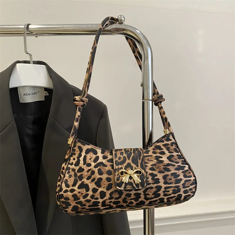Large casual women's handbag with sandwich pocket design in four colour options