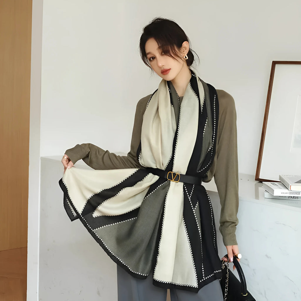 A woman wearing a printed polyester scarf, showing one of three style options, with dimensions of 180cm by 90cm.