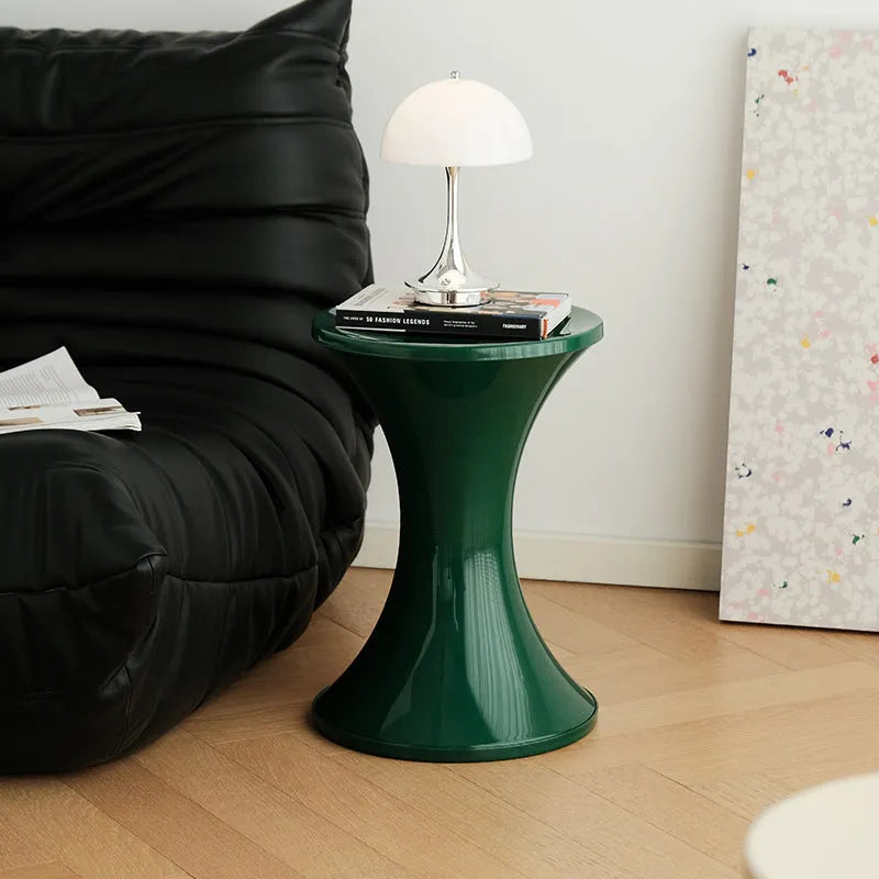 Hourglass-style plastic shoe changing stool in multiple colour options