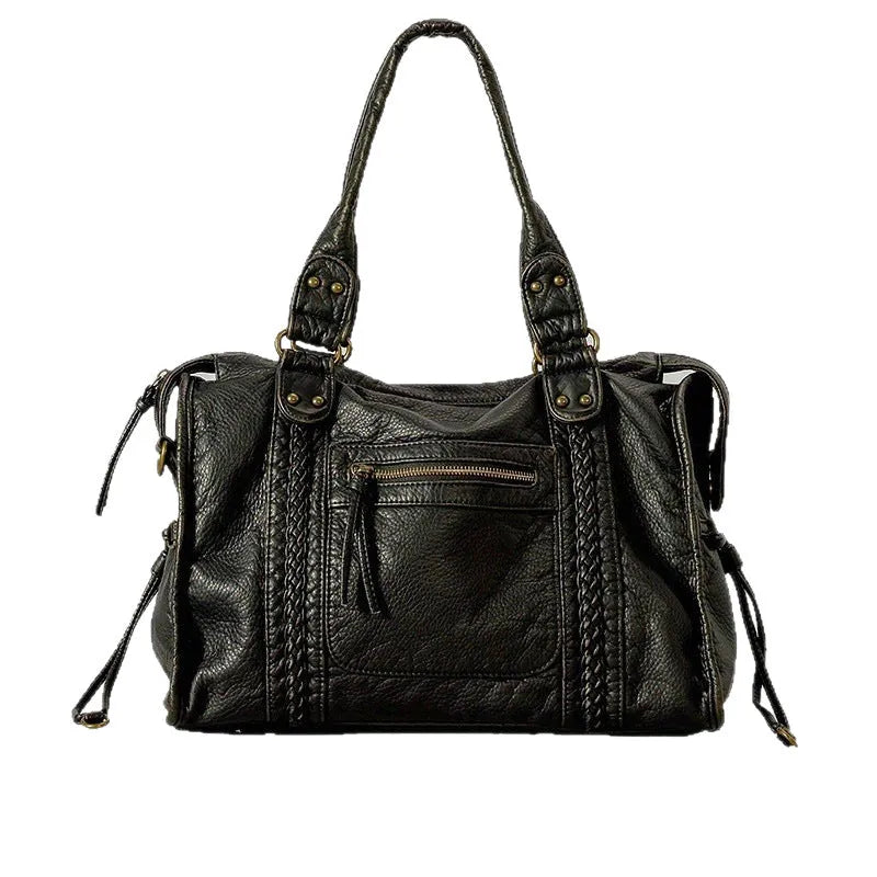 Women's French retro motorcycle messenger bag in soft PU leather with woven accents and internal compartments