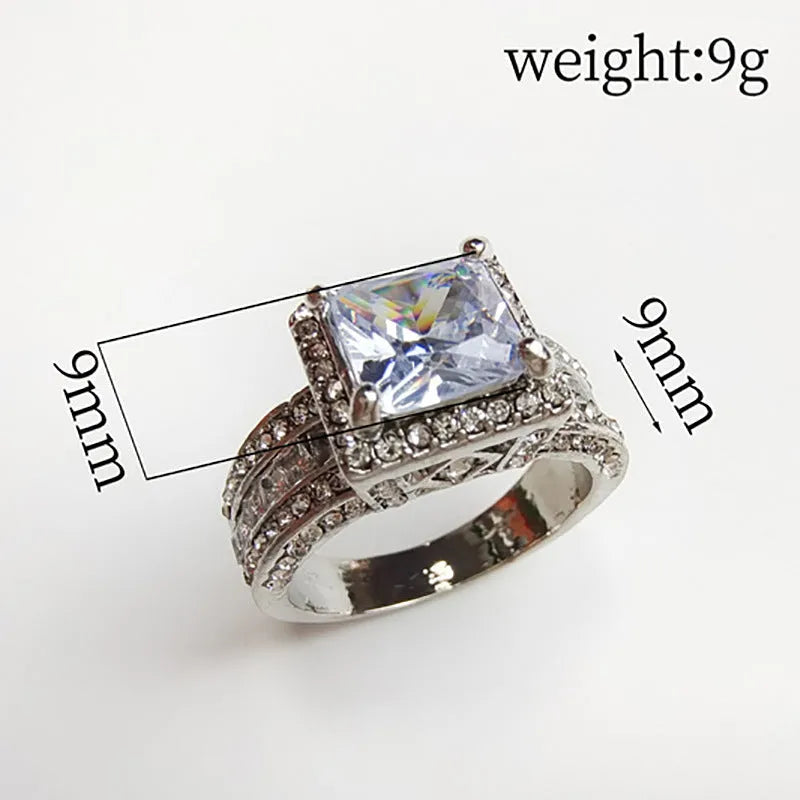 Geometric round design women's engagement ring in gold or white colour with angular patterns