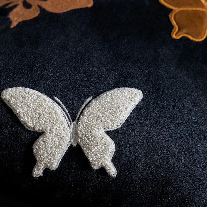 Square 45x45cm cushion with Chinese-style butterfly embroidery in beige, black, and purple colours.