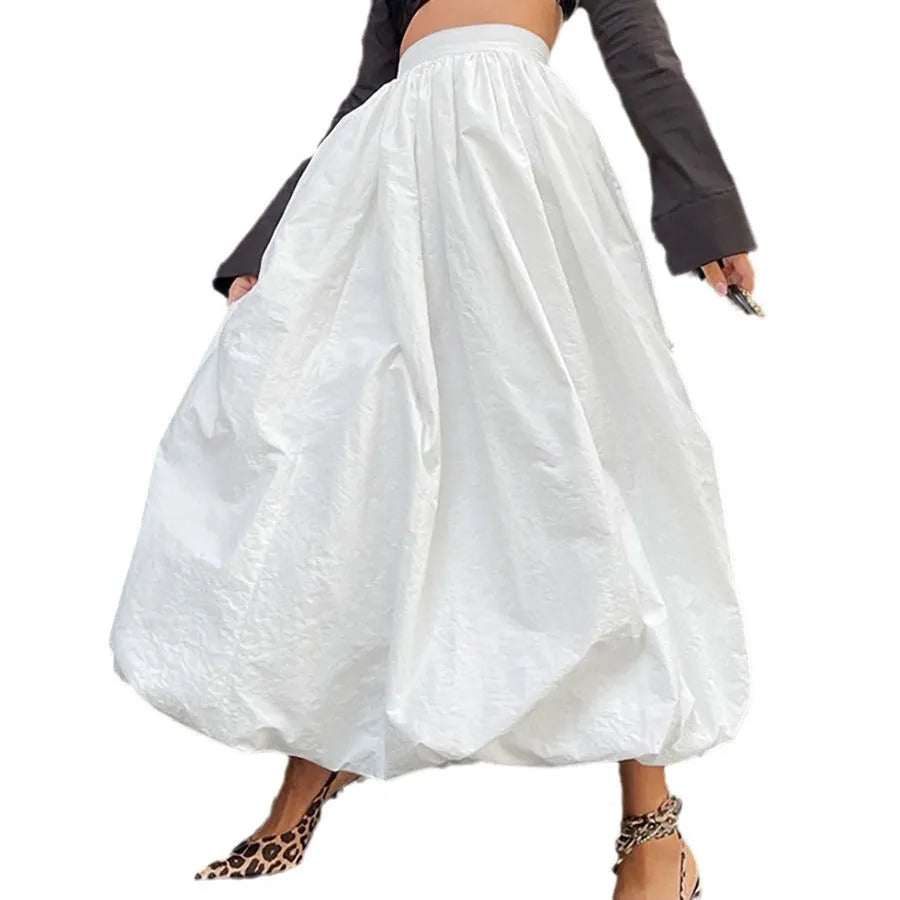 Women's long cotton skirt in solid black or white colour for casual wear.