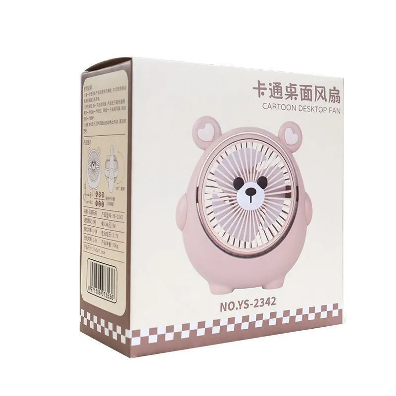Cute dog-themed USB desktop electric fan in one of six available colours on a desk.