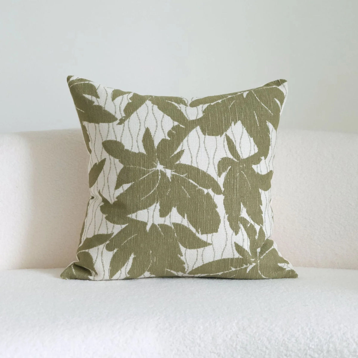 Silent Wind green cotton linen hotel pillow with striped botanical pattern and tassel trim in multiple size options