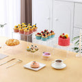 White and transparent plastic six-piece suit cube desktop dessert display stand.