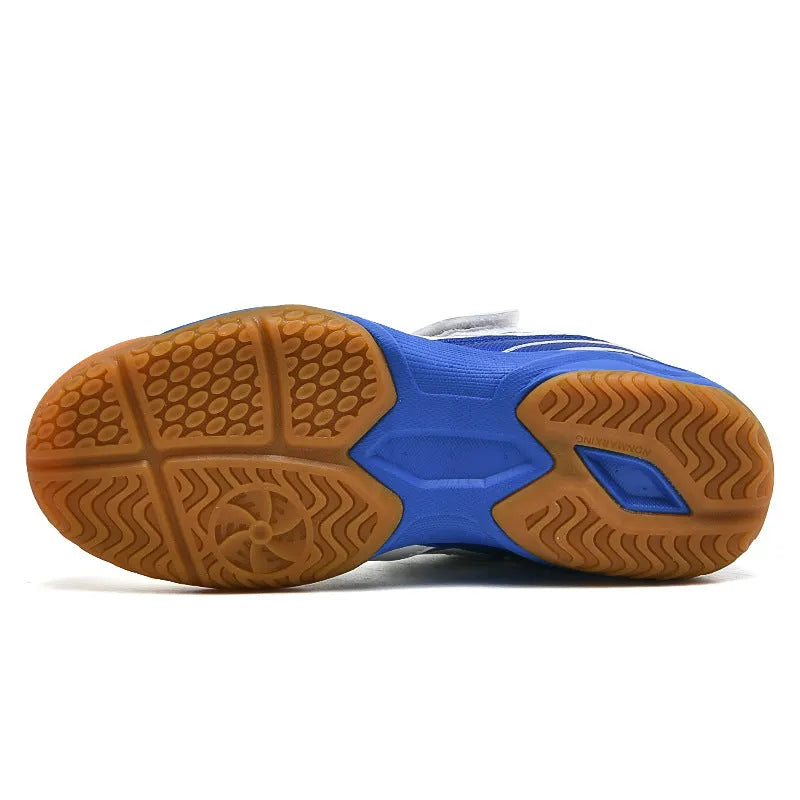 White and blue badminton shoes with ribbed PVC soles and low-top wedge heel design