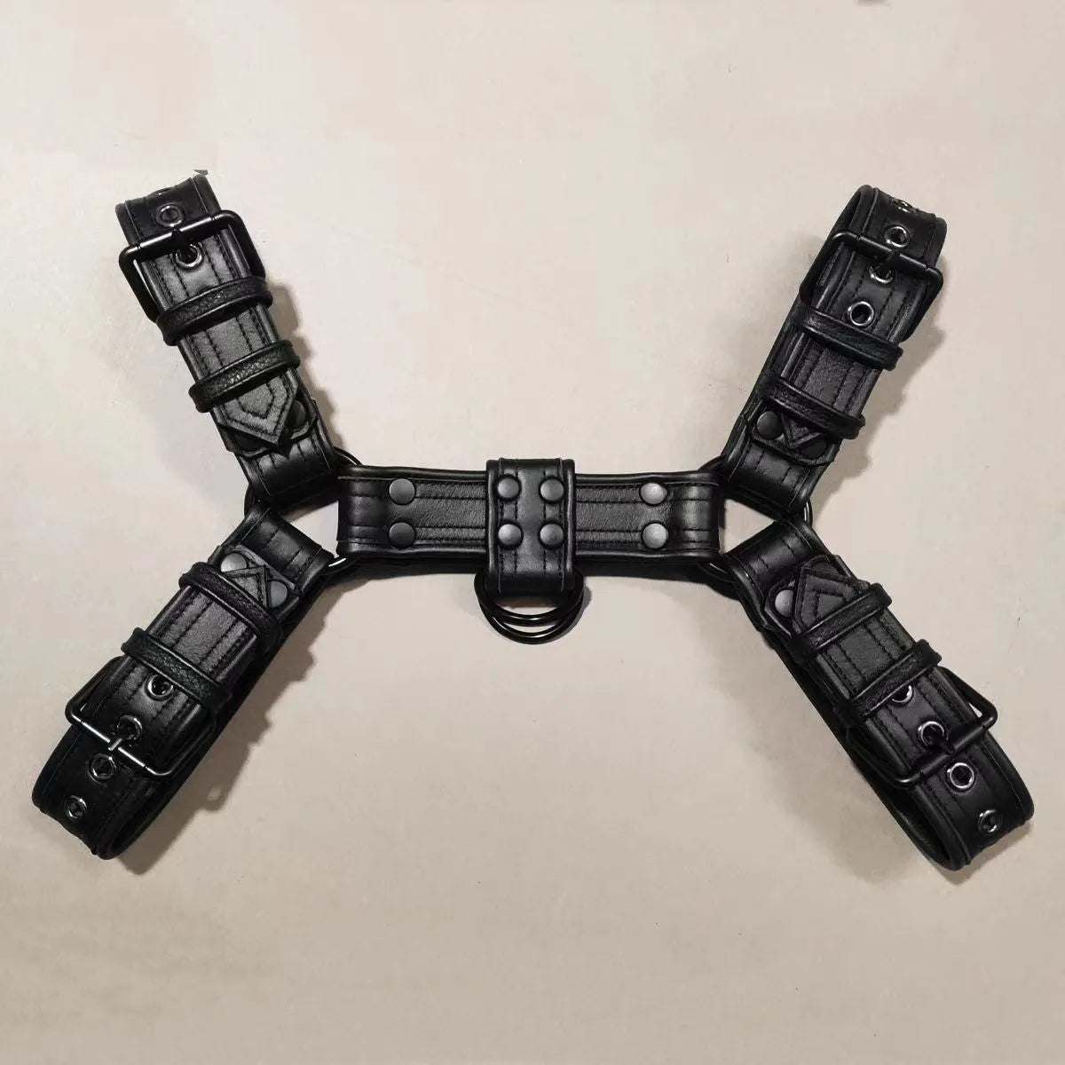 Black leather chest bondage strap with metal buckle for adjustable muscle harness costumes
