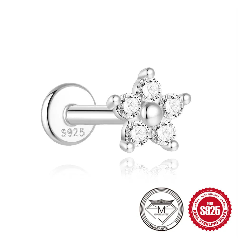 S925 sterling silver stud earrings with geometric petal design in platinum colour on ear.