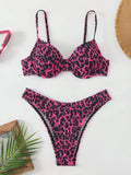 Women's leopard print backless bikini swimsuit in brown mixed colour, showing briefs style and sleeveless design.