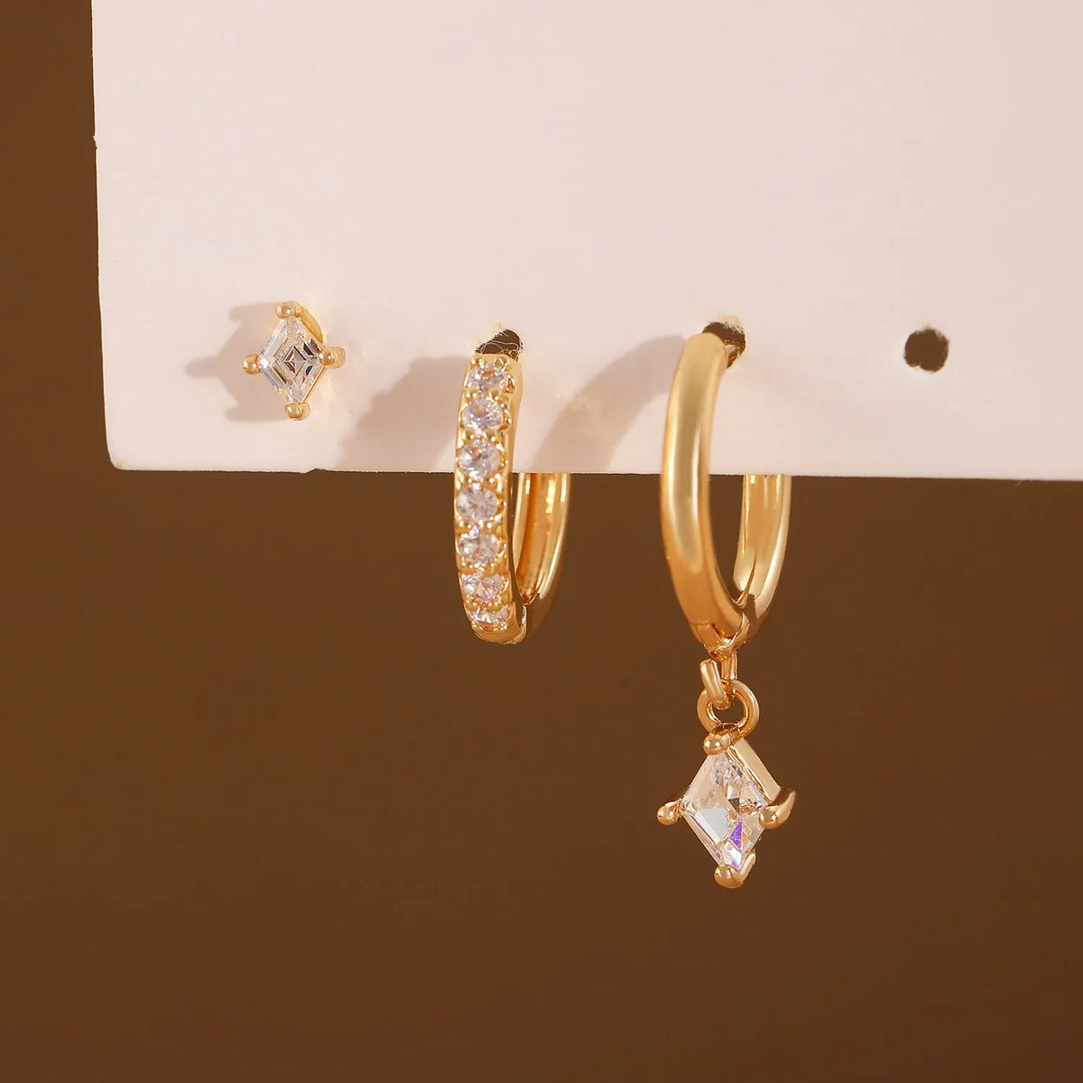 Ladies three-piece geometric earring set with zircon stones in gold and silver colour options