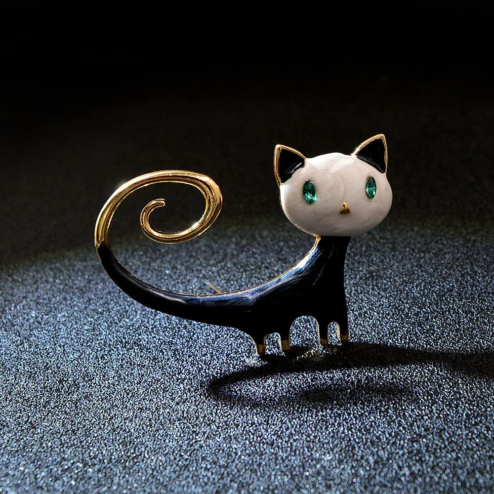 Women's alloy cat brooch with painted tailing-up kitty design in white or orange