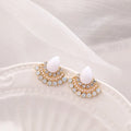 Women's silver retro fan-shaped earrings with opal centre and rhinestone detailing on geometric design