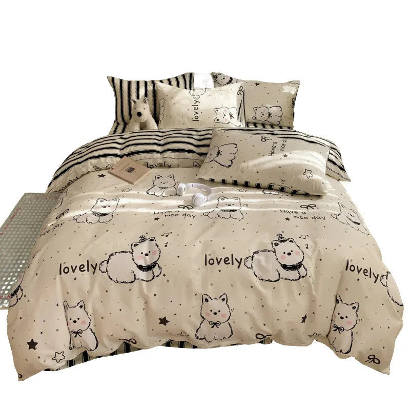 Cartoon dog pattern pure cotton four-piece bed sheet set on a bed